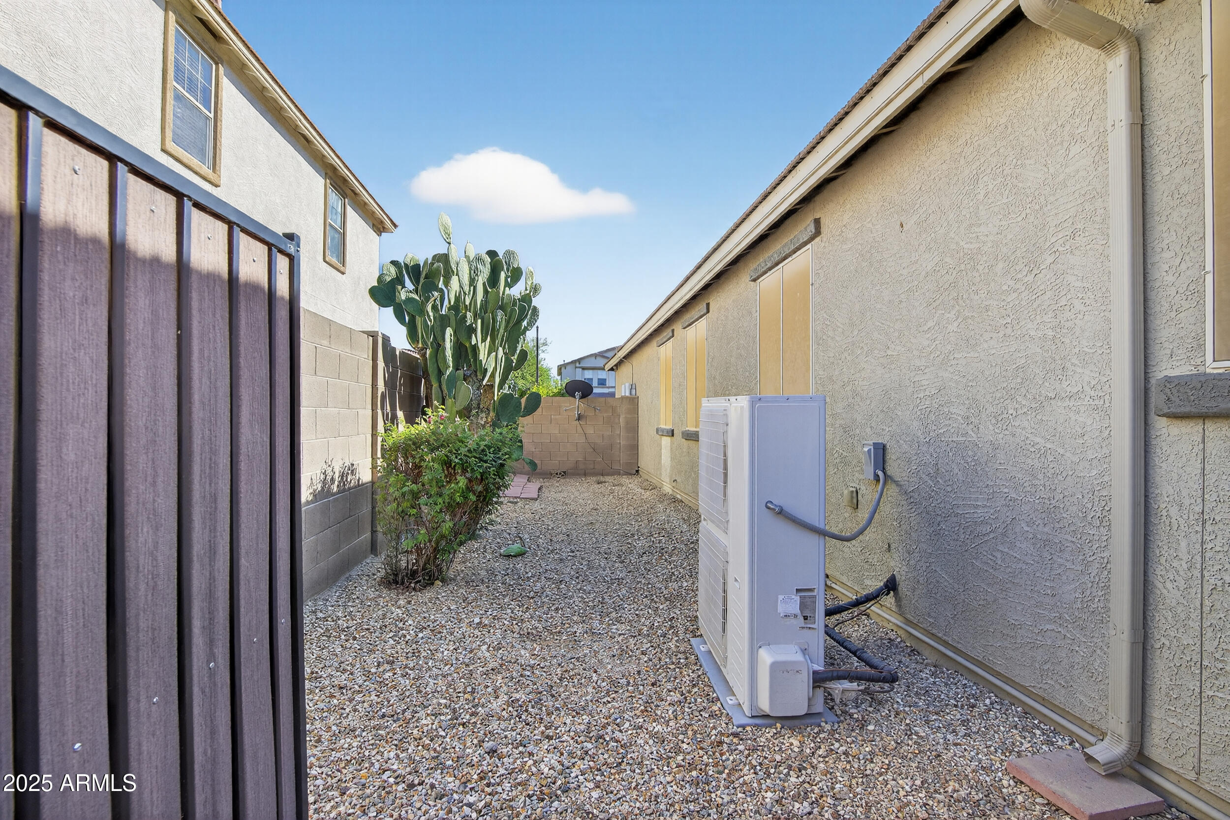 17368 West Red Bird Road Surprise, AZ 85387 - Photo 60 of 82 a house view with a garden space