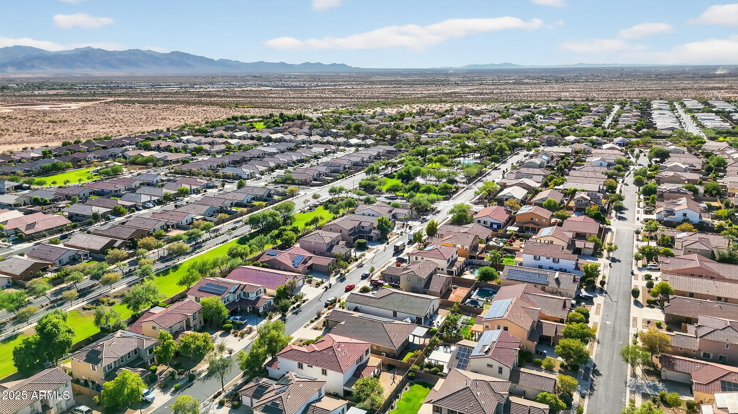 17368 West Red Bird Road Surprise, AZ 85387 - Photo 70 of 82 a view of a city with a lake
