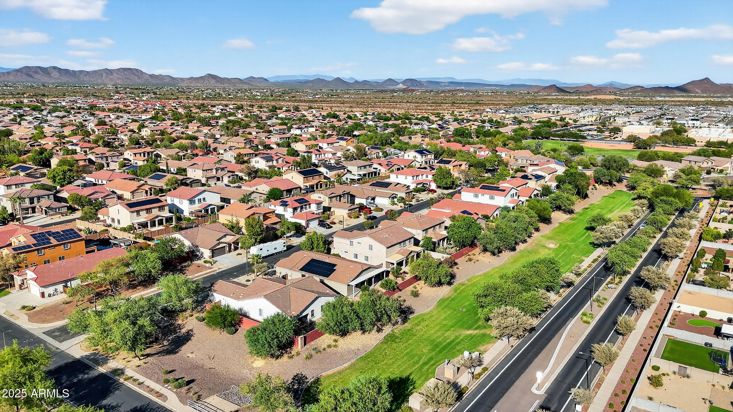 17368 West Red Bird Road Surprise, AZ 85387 - Photo 78 of 82 an aerial view of residential houses with outdoor space and street view