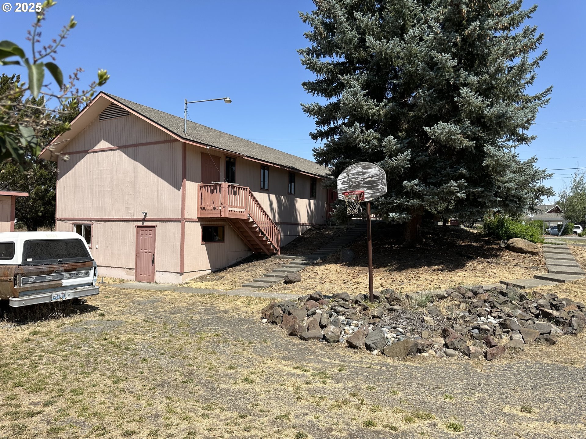 46576 Mission Road Pendleton, OR 97801 - Photo 2 of 31 a car parked in front of a house