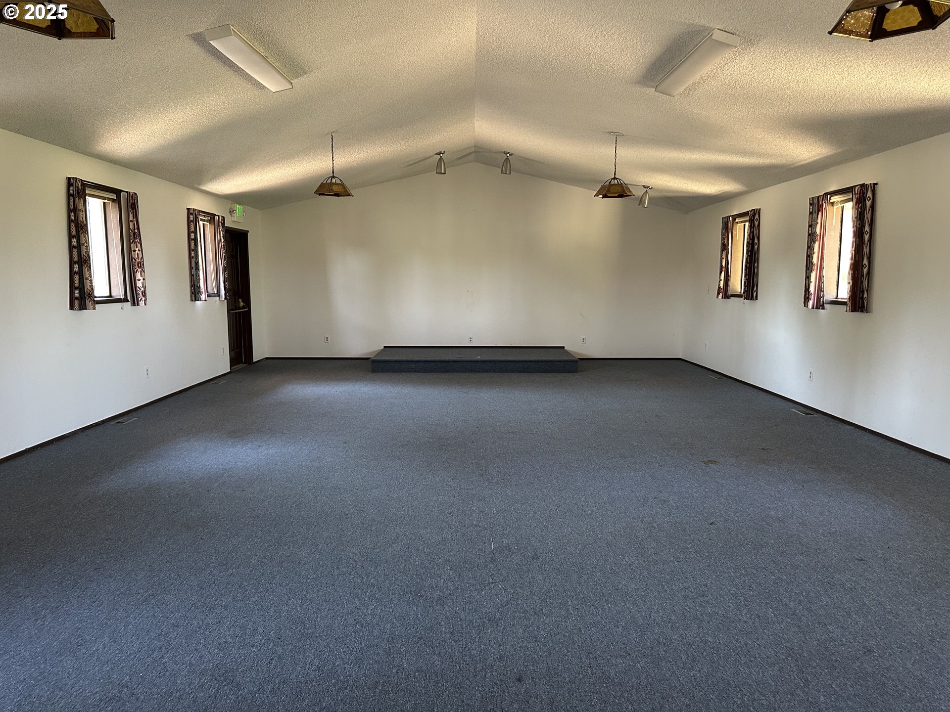 46576 Mission Road Pendleton, OR 97801 - Photo 5 of 31 a view of a livingroom with a staircase