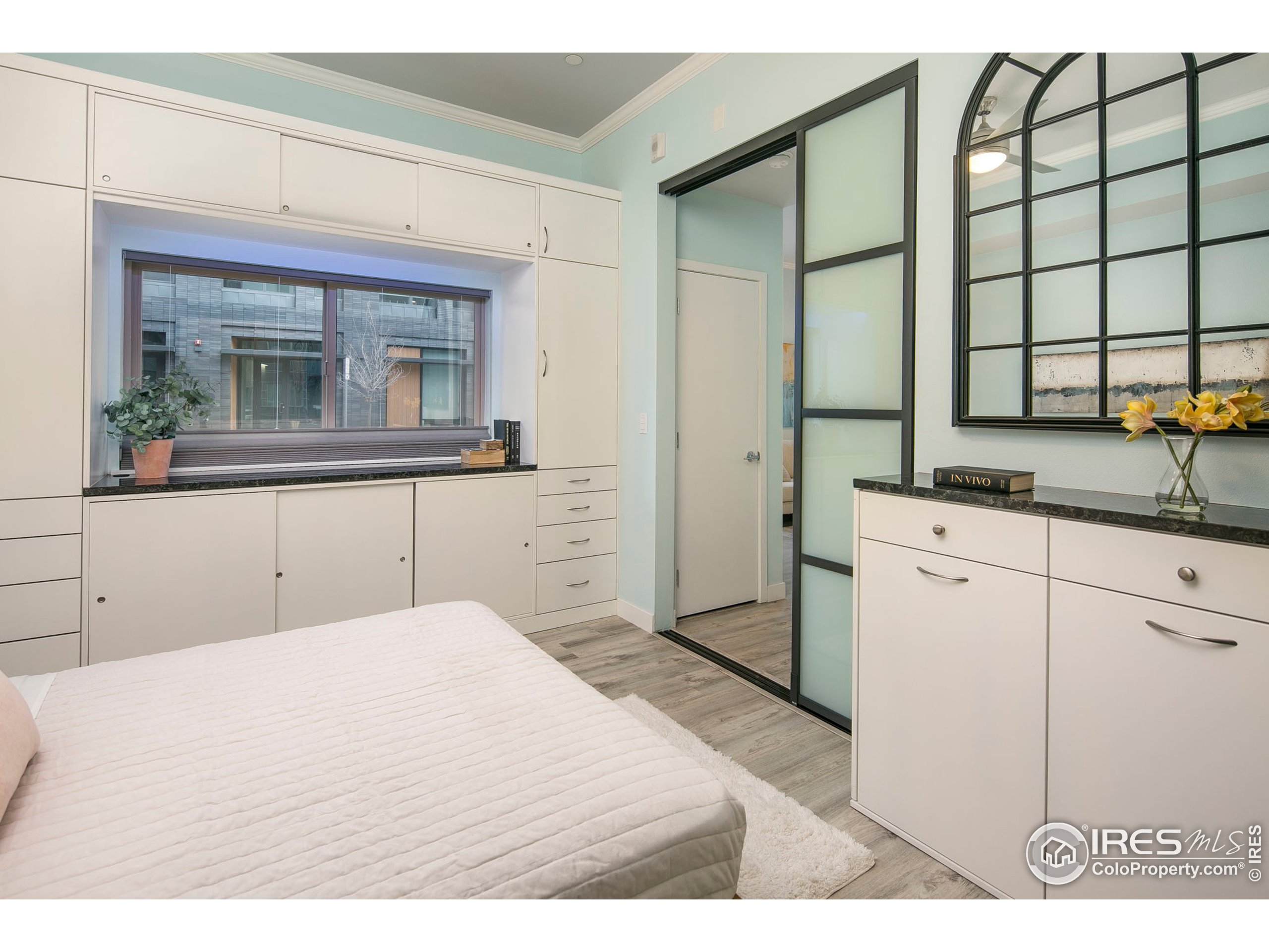 2445 Junction Place, Unit 103 Boulder, CO 80301 - Photo 15 of 29 a kitchen with a sink and cabinets
