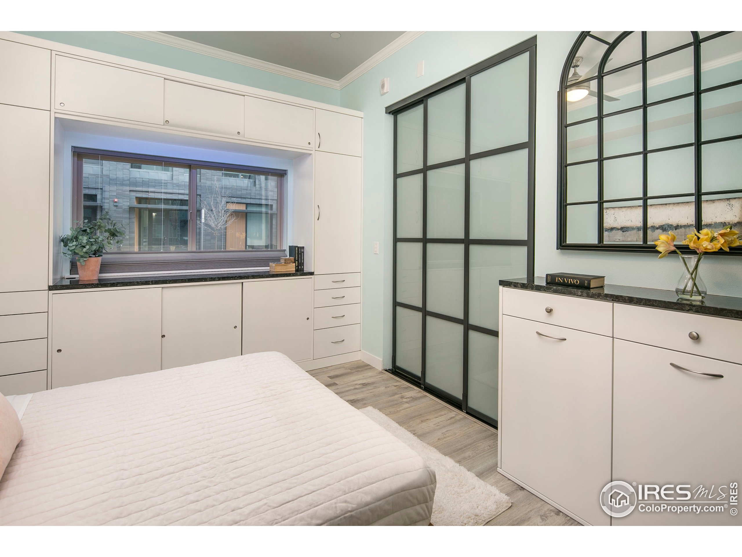2445 Junction Place, Unit 103 Boulder, CO 80301 - Photo 16 of 29 a kitchen with a sink and cabinets