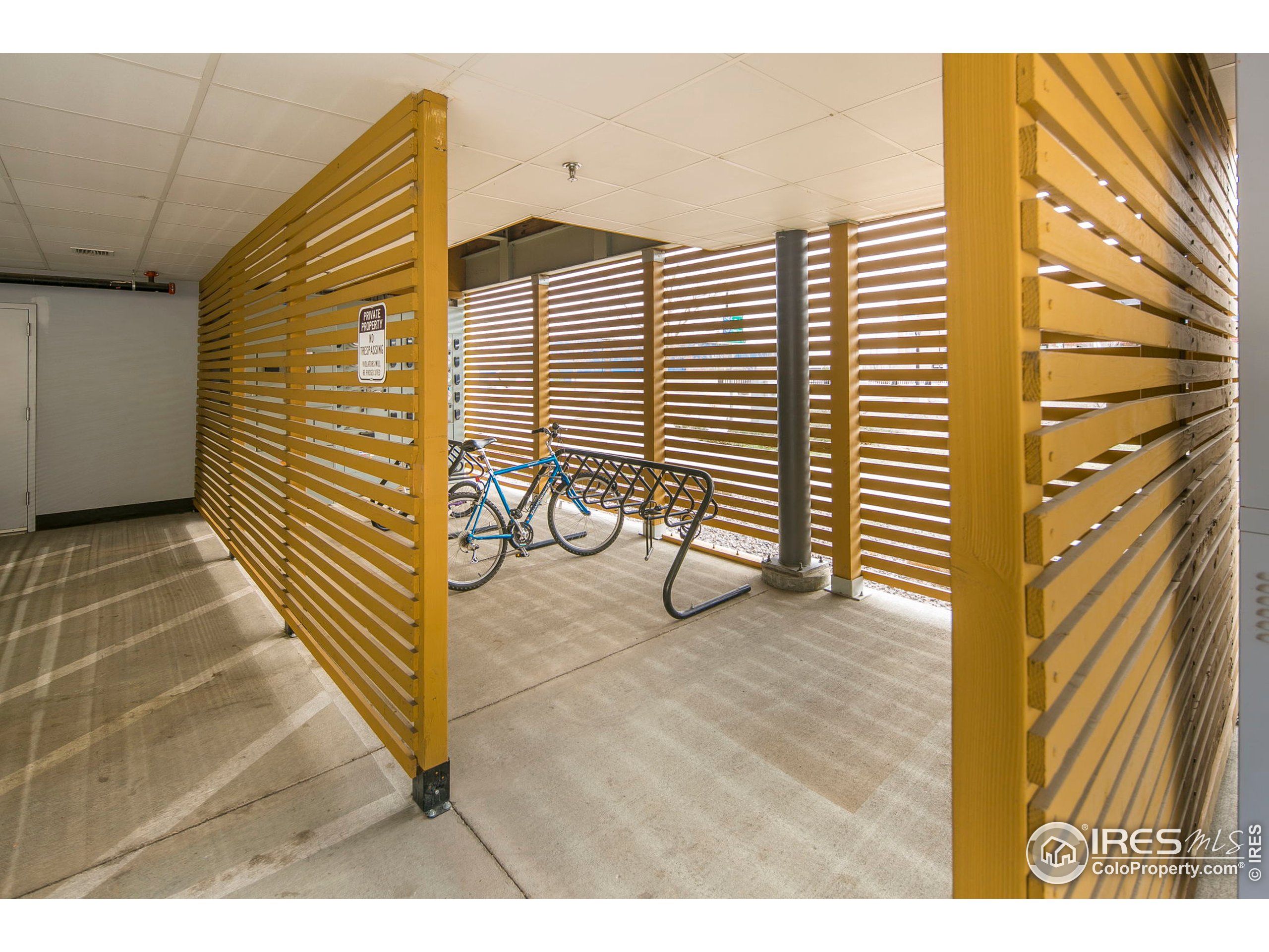 2445 Junction Place, Unit 103 Boulder, CO 80301 - Photo 19 of 29 a view of a terrace with wooden floor