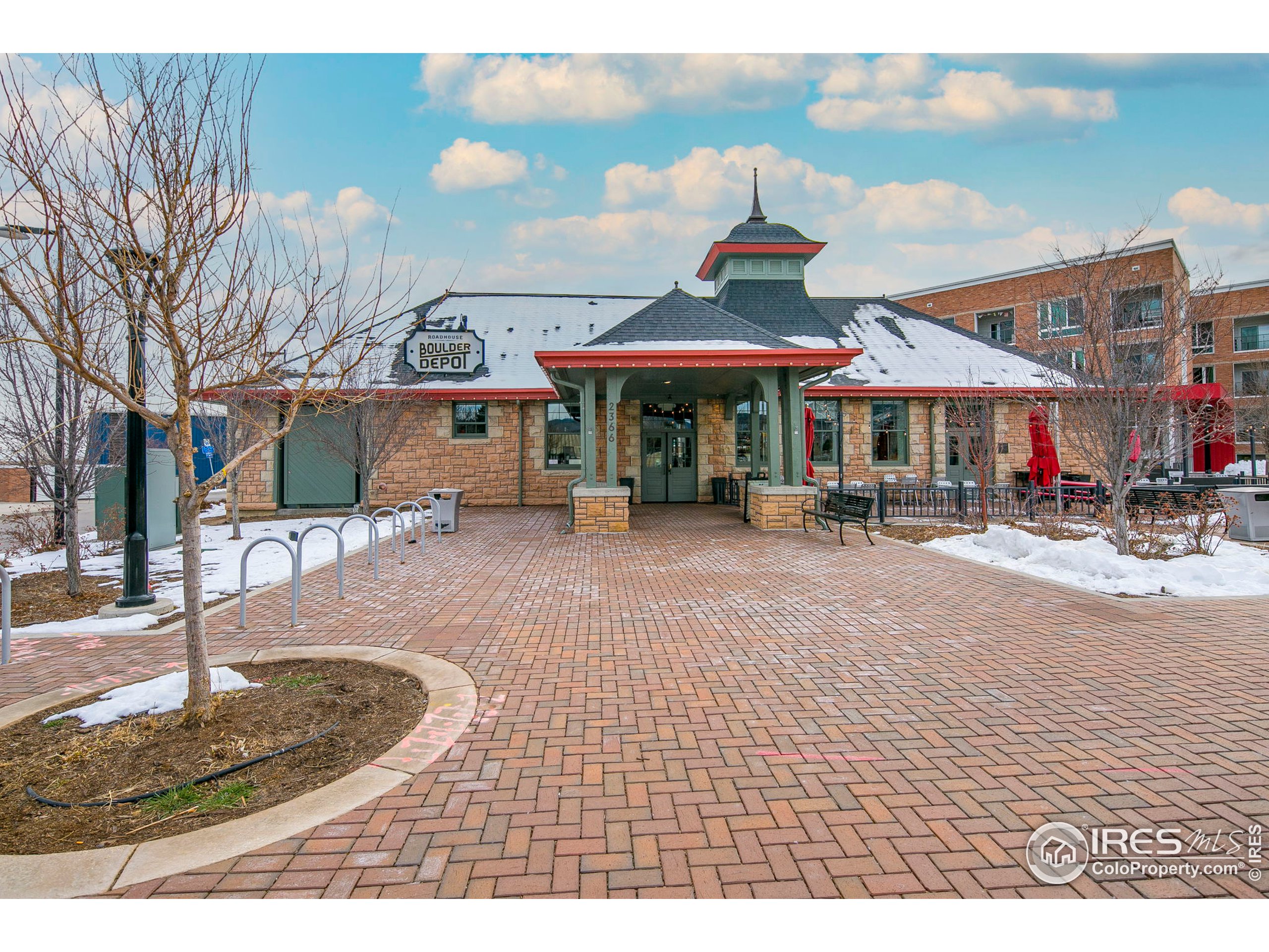 2445 Junction Place, Unit 103 Boulder, CO 80301 - Photo 25 of 29 a front view of a building with street