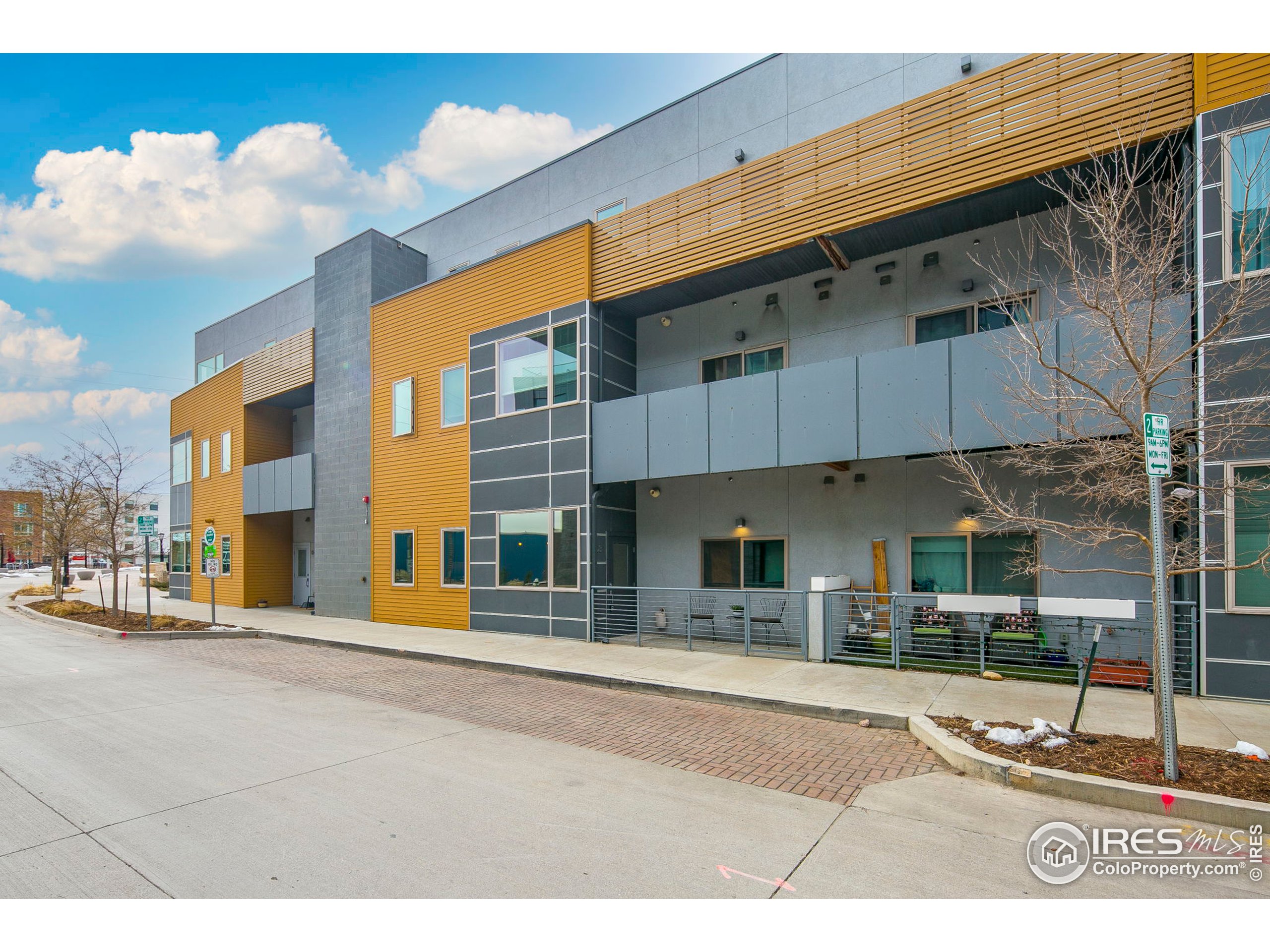 2445 Junction Place, Unit 103 Boulder, CO 80301 - Photo 3 of 29 a view of a building with a street