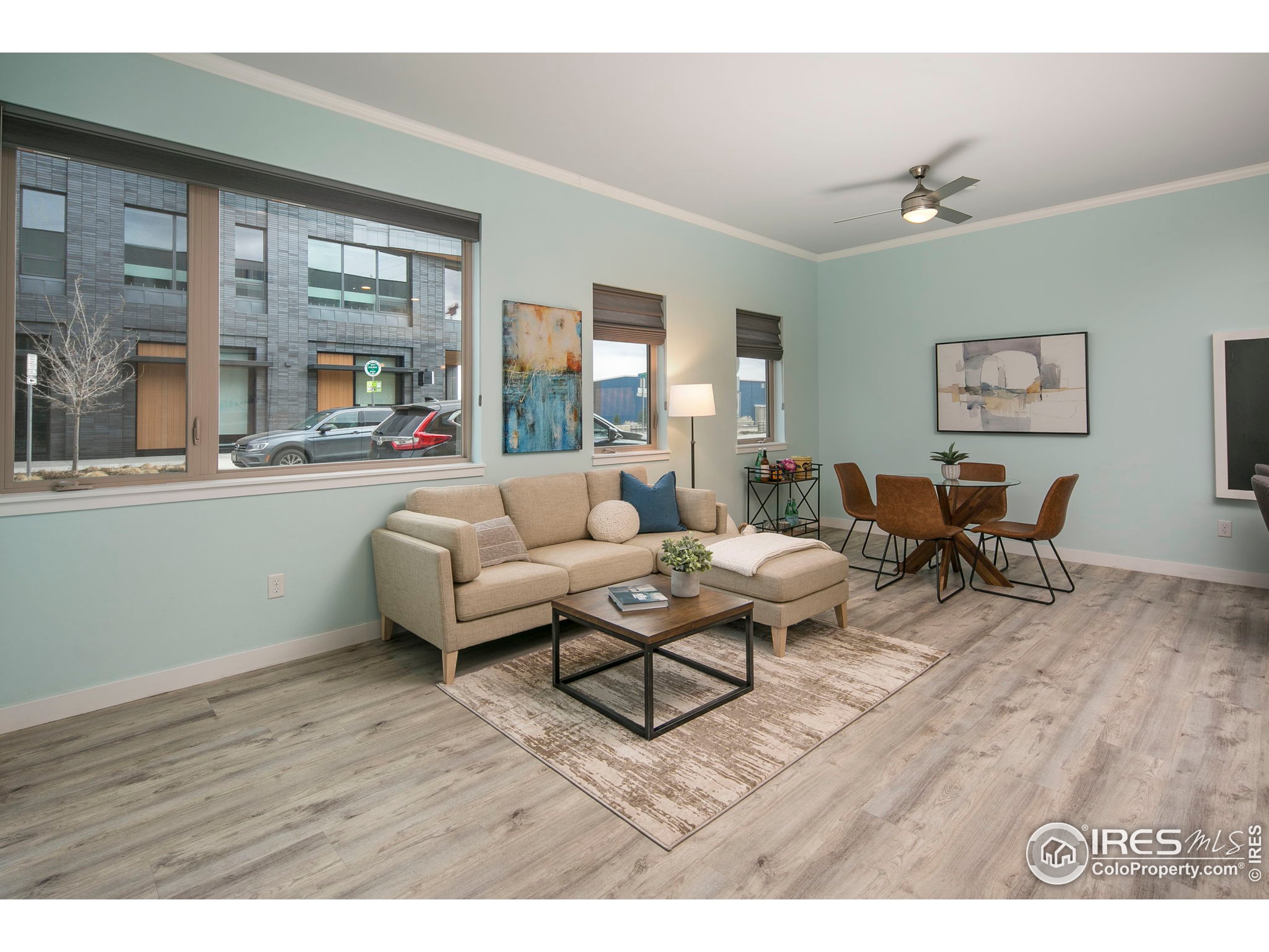 2445 Junction Place, Unit 103 Boulder, CO 80301 - Photo 10 of 29 a living room with furniture and a large window