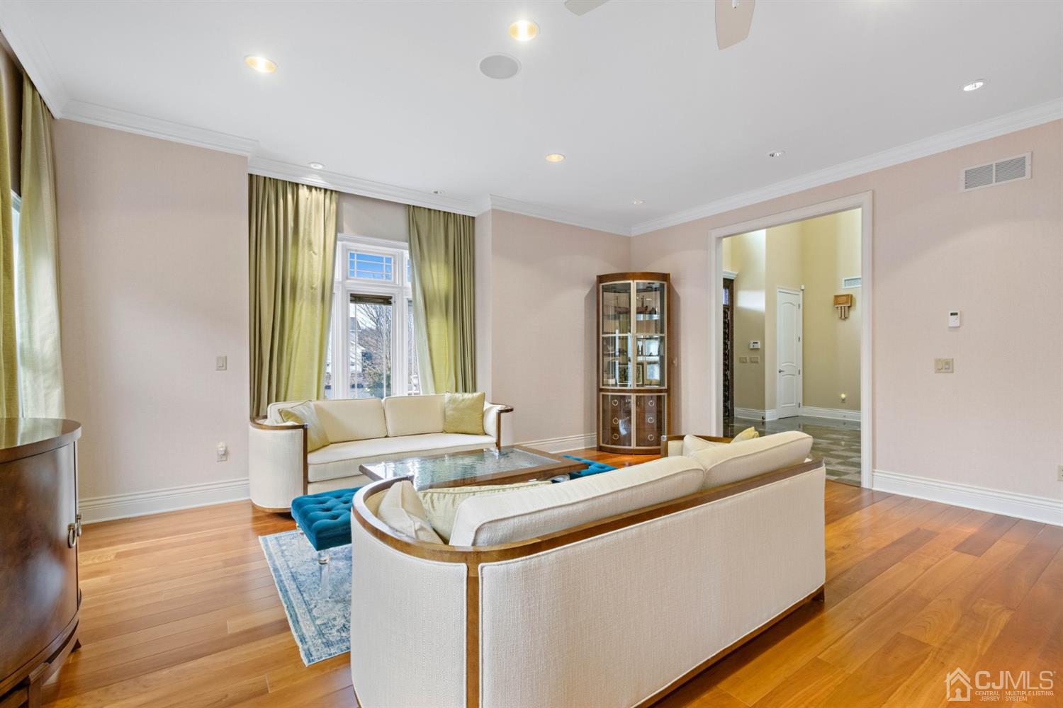 8 Madden Court Edison, NJ 08820 - Photo 11 of 75 a living room with stainless steel appliances granite countertop furniture and a large window