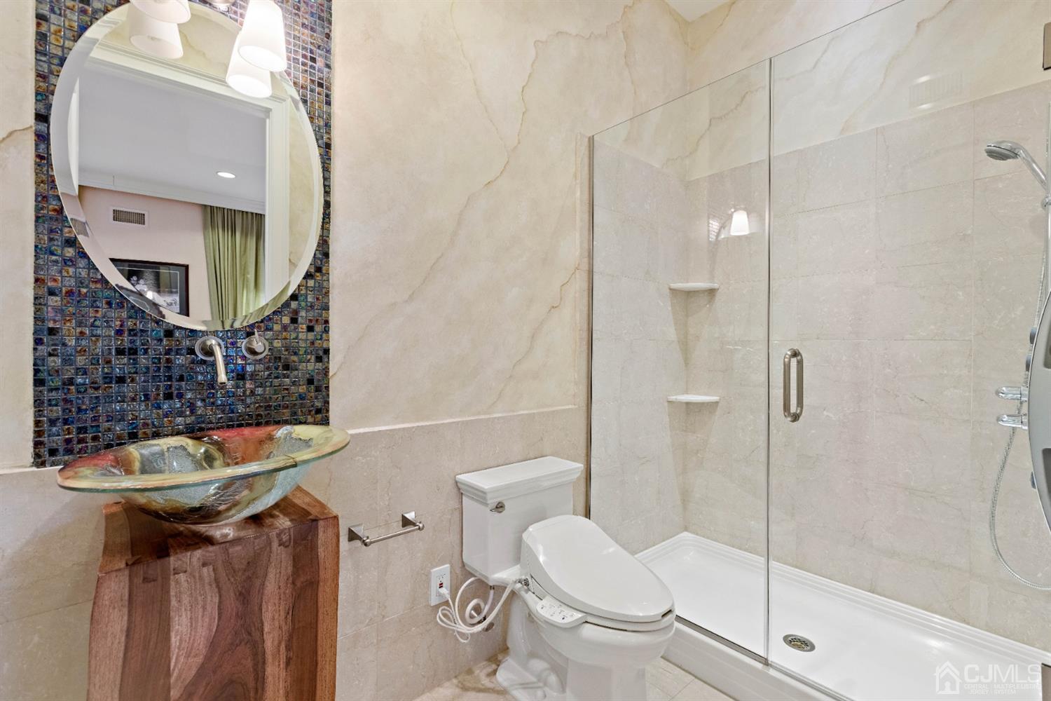 8 Madden Court Edison, NJ 08820 - Photo 13 of 75 a bathroom with a toilet and a shower