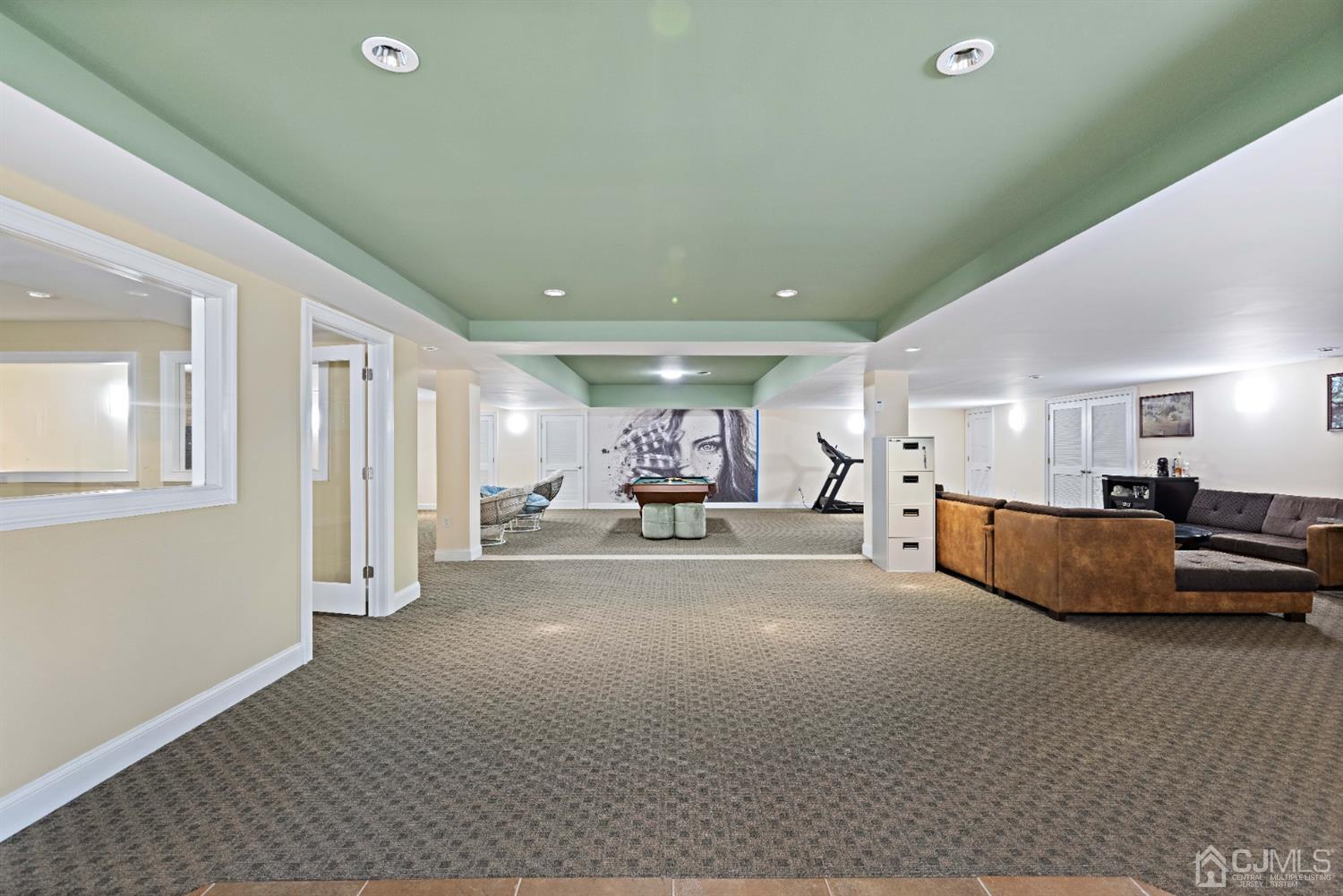 8 Madden Court Edison, NJ 08820 - Photo 43 of 75 a view of a livingroom with furniture and a couch