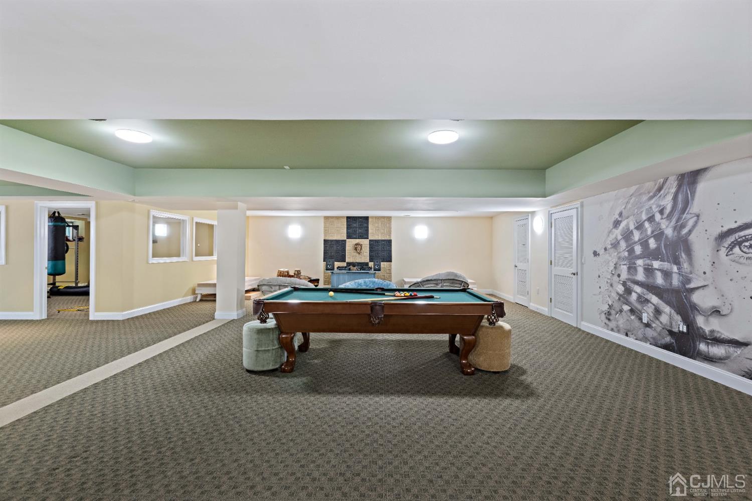 8 Madden Court Edison, NJ 08820 - Photo 45 of 75 a living room with a couch and wooden floor
