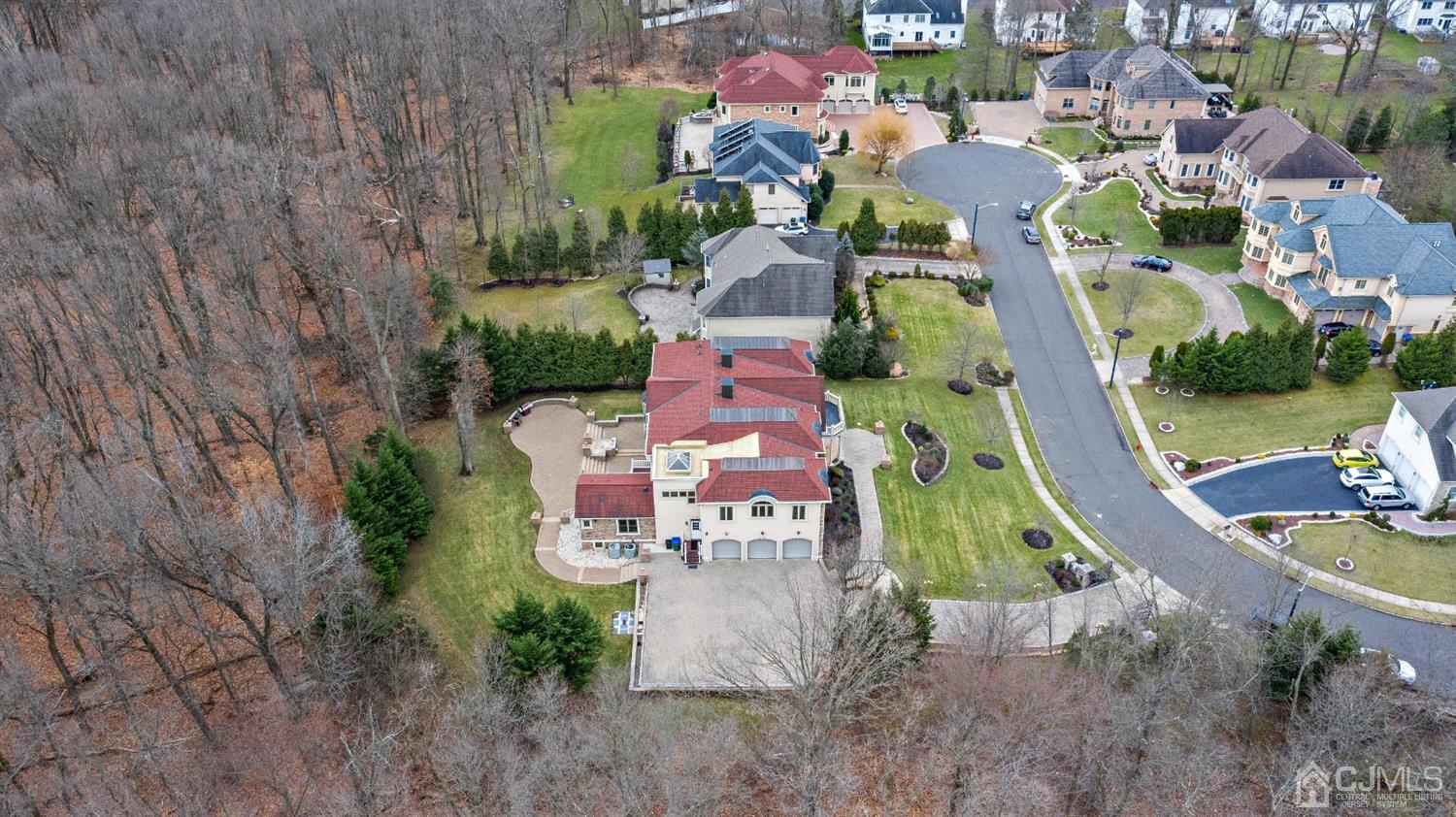 8 Madden Court Edison, NJ 08820 - Photo 7 of 75 an aerial view of a house with outdoor space pool seating area and yard