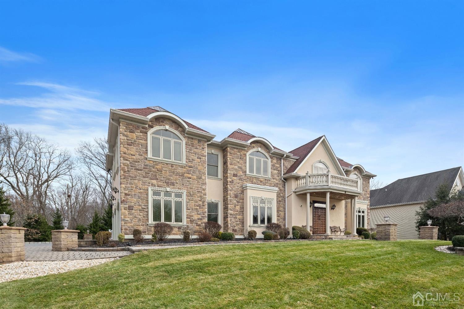 8 Madden Court Edison, NJ 08820 - Photo 67 of 75 a front view of a house with a yard