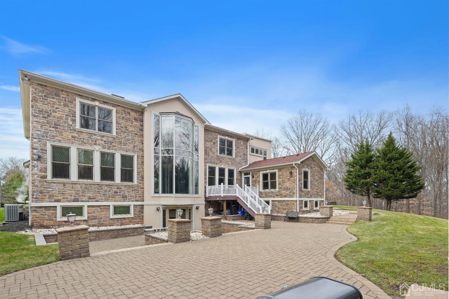 8 Madden Court Edison, NJ 08820 - Photo 72 of 75 a front view of a residential houses with yard and trees