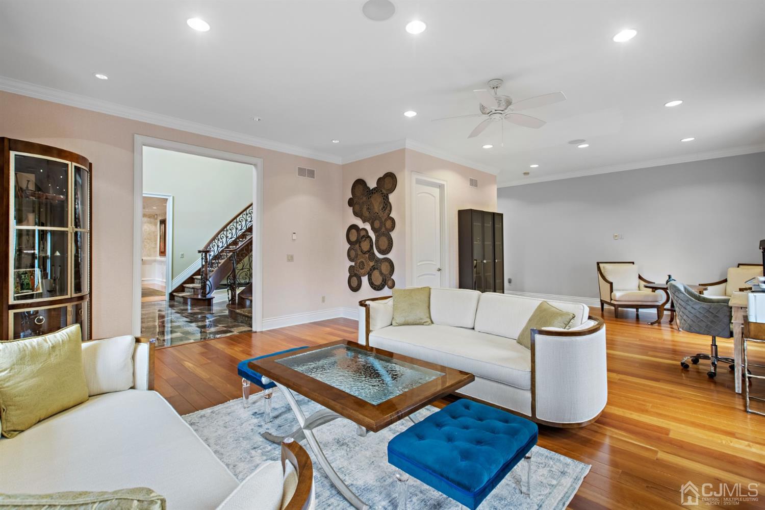 8 Madden Court Edison, NJ 08820 - Photo 9 of 75 a living room with furniture and wooden floor