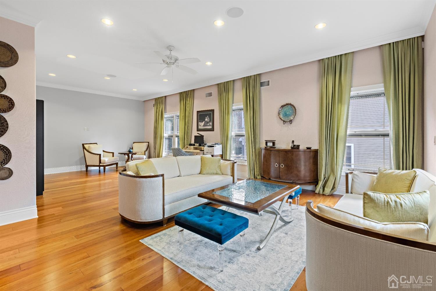 8 Madden Court Edison, NJ 08820 - Photo 10 of 75 a living room with furniture and wooden floor