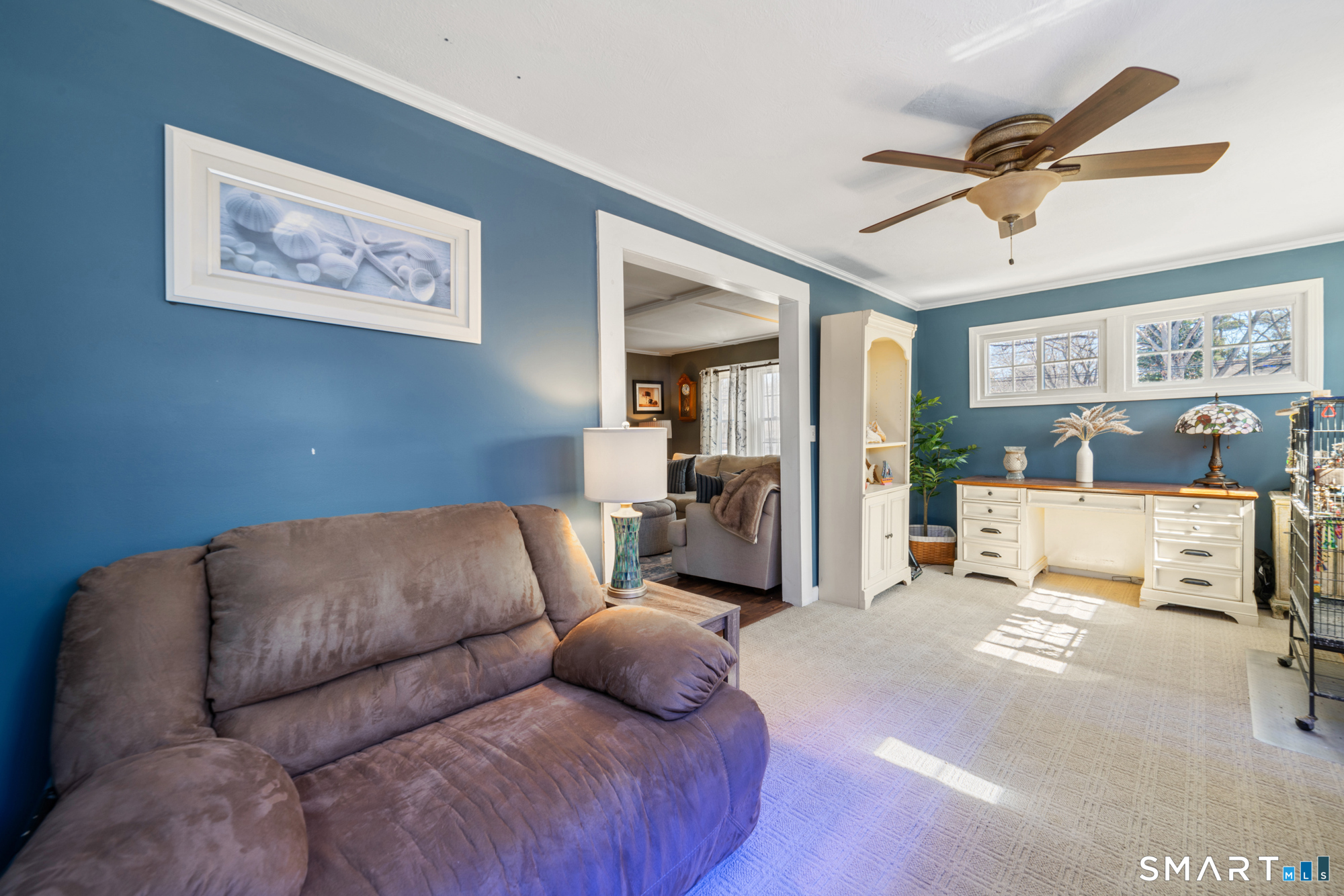 101 Vincent Road Bristol, CT 06010 - Photo 12 of 37 a living room with furniture and a flat screen tv
