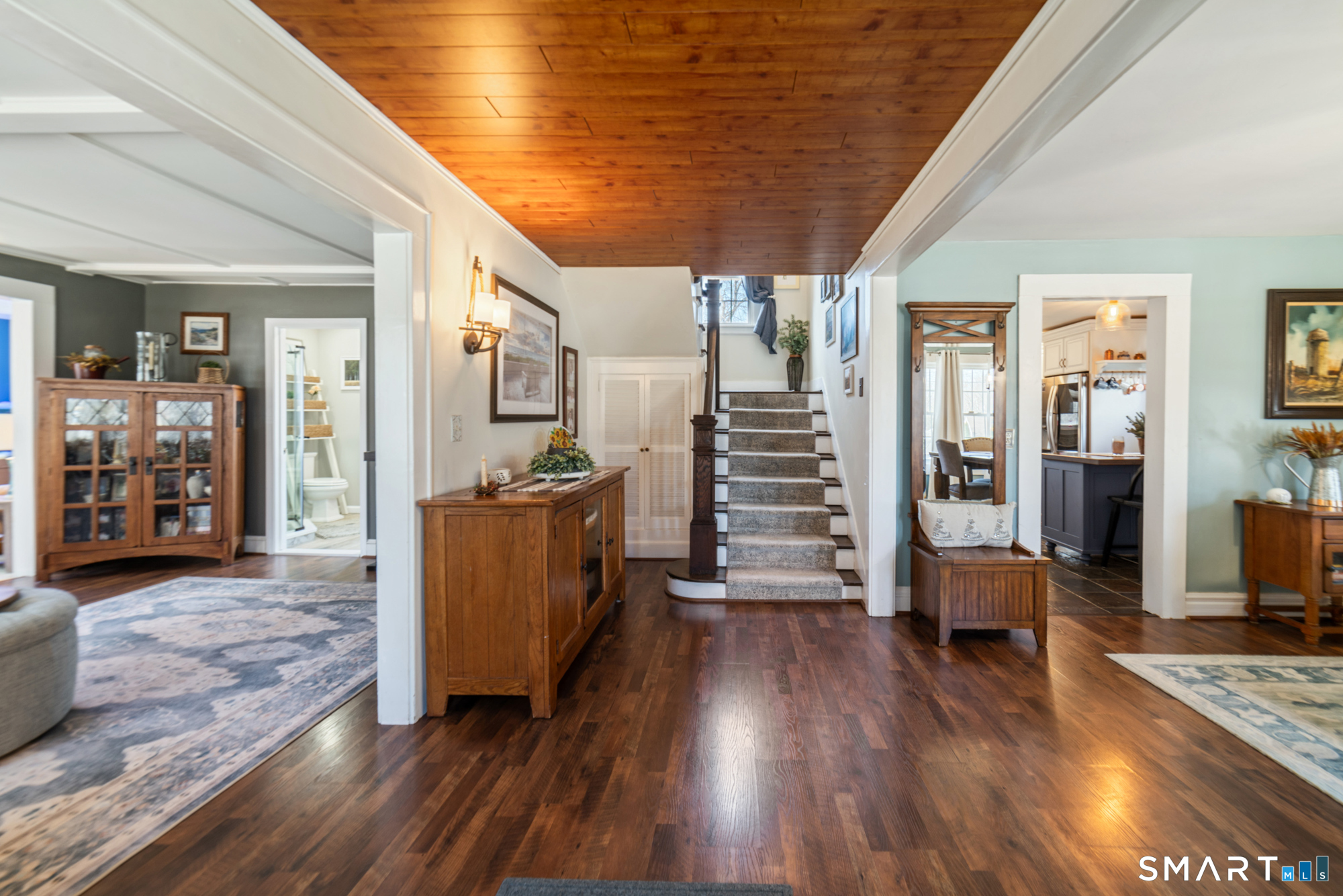 101 Vincent Road Bristol, CT 06010 - Photo 3 of 37 a living room with furniture and a wooden floor