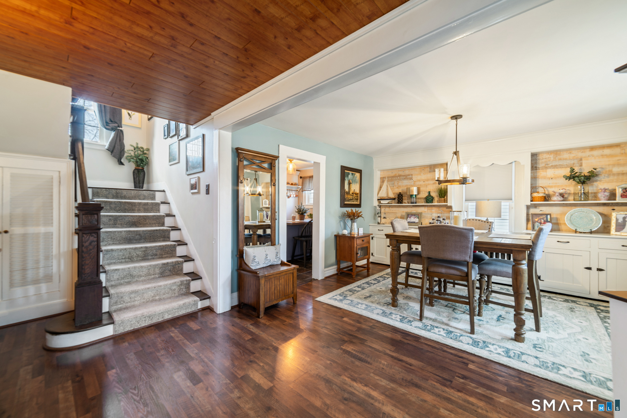 101 Vincent Road Bristol, CT 06010 - Photo 4 of 37 a view of a livingroom with furniture and staircase