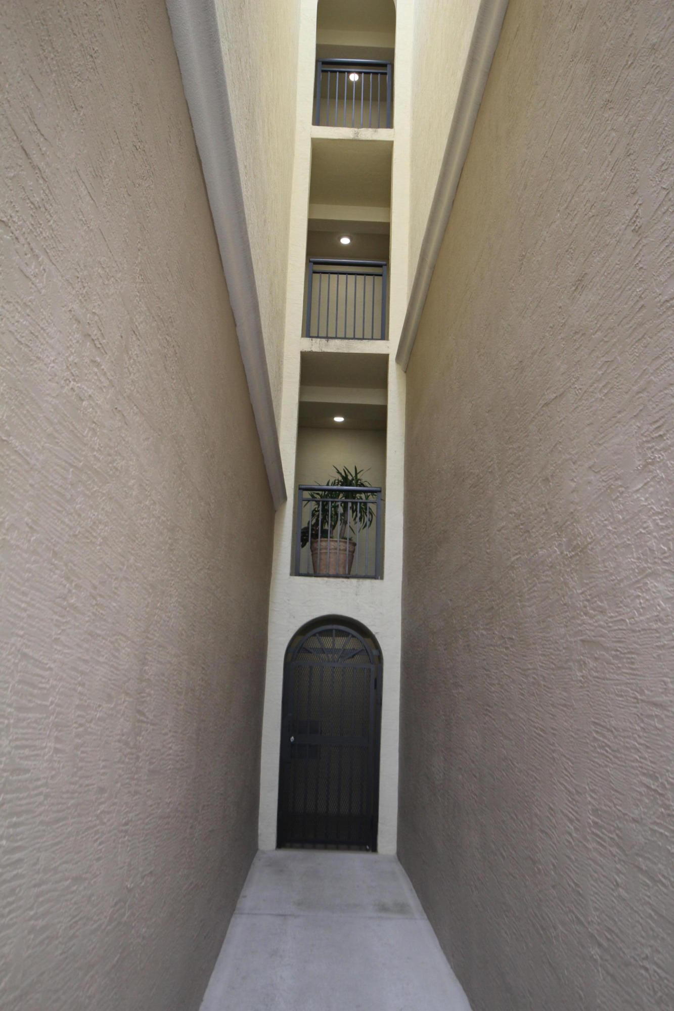 3301 Renaissance Way, Unit 301 Boynton Beach, FL 33426 - Photo 23 of 38 Security Gate Bldg 3