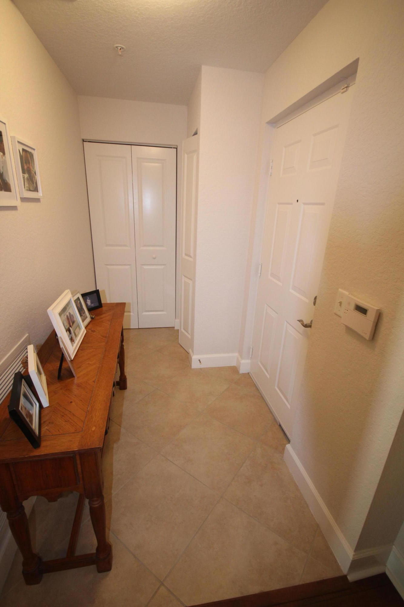 3301 Renaissance Way, Unit 301 Boynton Beach, FL 33426 - Photo 4 of 38 Foyer