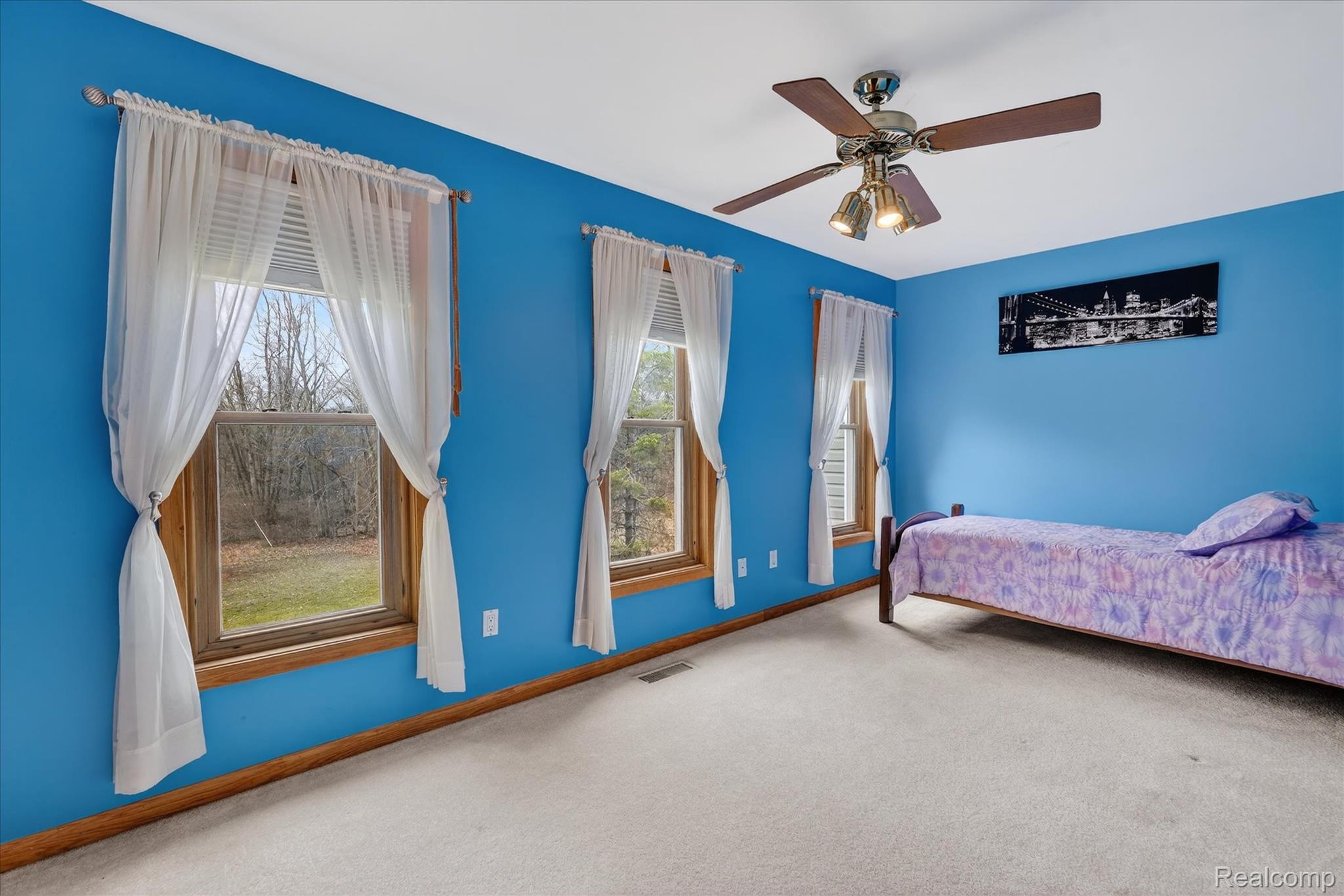 5640 Fisher Road Howell, MI 48855 - Photo 43 of 66 Carpeted bedroom featuring baseboards and a ceiling fan