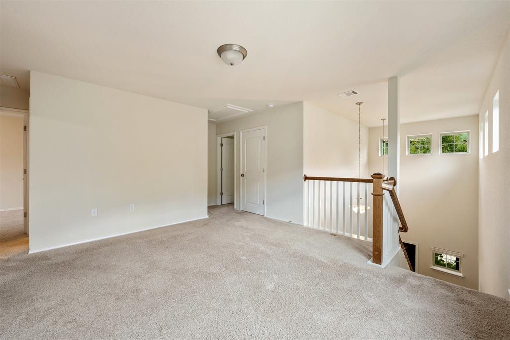 10612 Turnbull Loop, Unit 30 Austin, TX 78717 - Photo 11 of 30 a view of an empty room with stairs