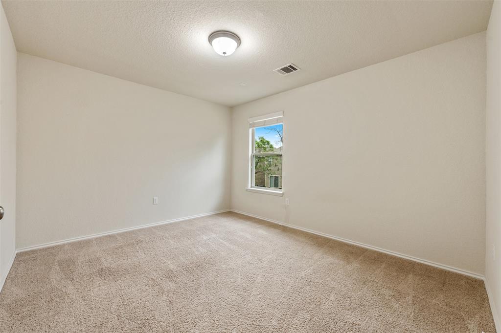 10612 Turnbull Loop, Unit 30 Austin, TX 78717 - Photo 20 of 30 an empty room with windows