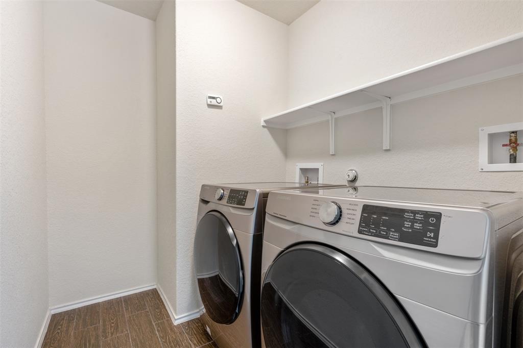 10612 Turnbull Loop, Unit 30 Austin, TX 78717 - Photo 25 of 30 a utility room with dryer and washer