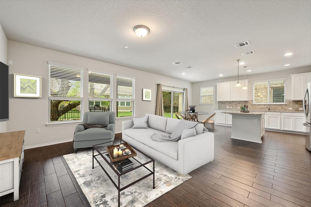 10612 Turnbull Loop, Unit 30 Austin, TX 78717 - Photo 6 of 30 a living room with furniture and a large window