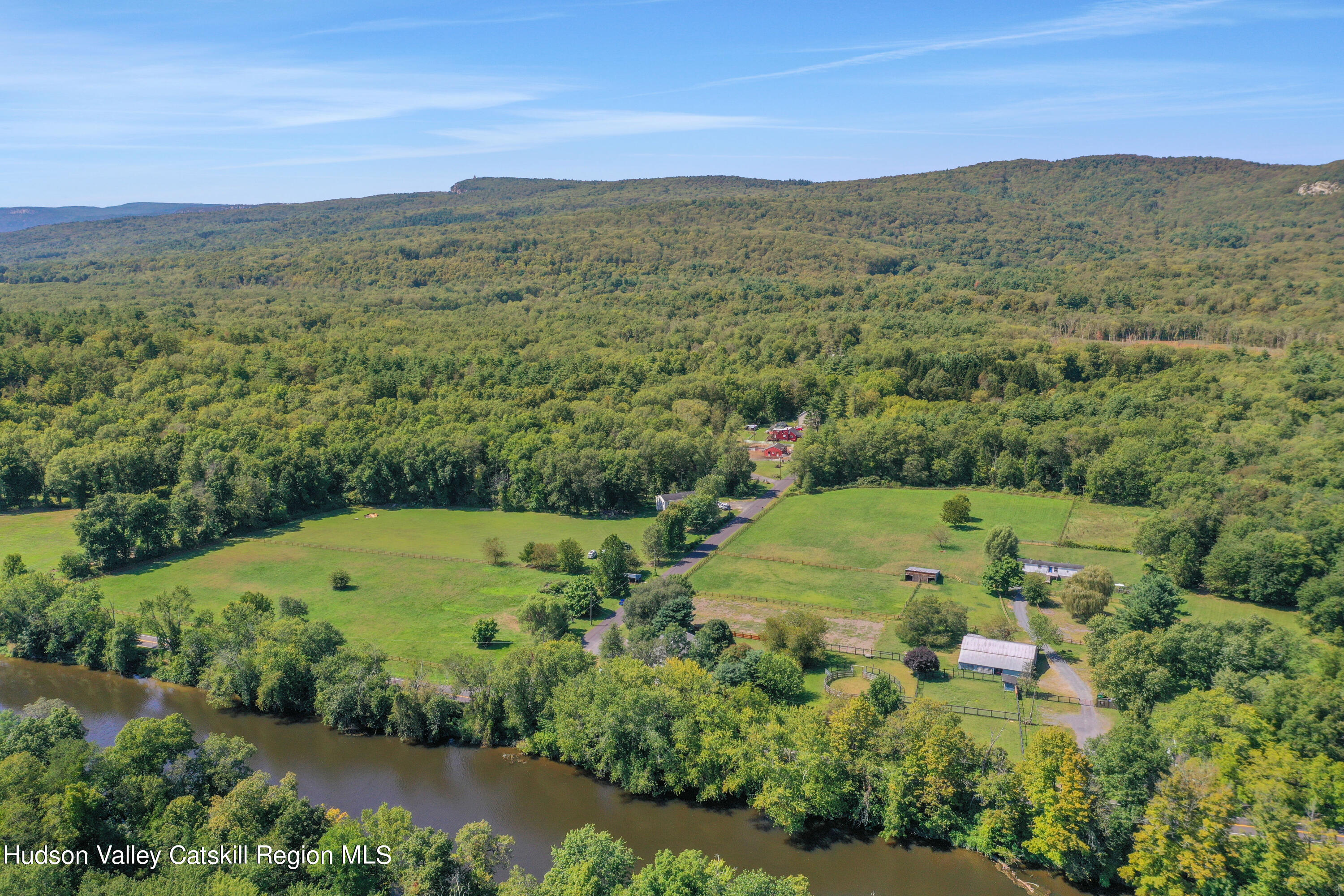 1 Dug Road New Paltz, NY 12561 - Photo 1 of 26 a view of a lush green hillside and a houses