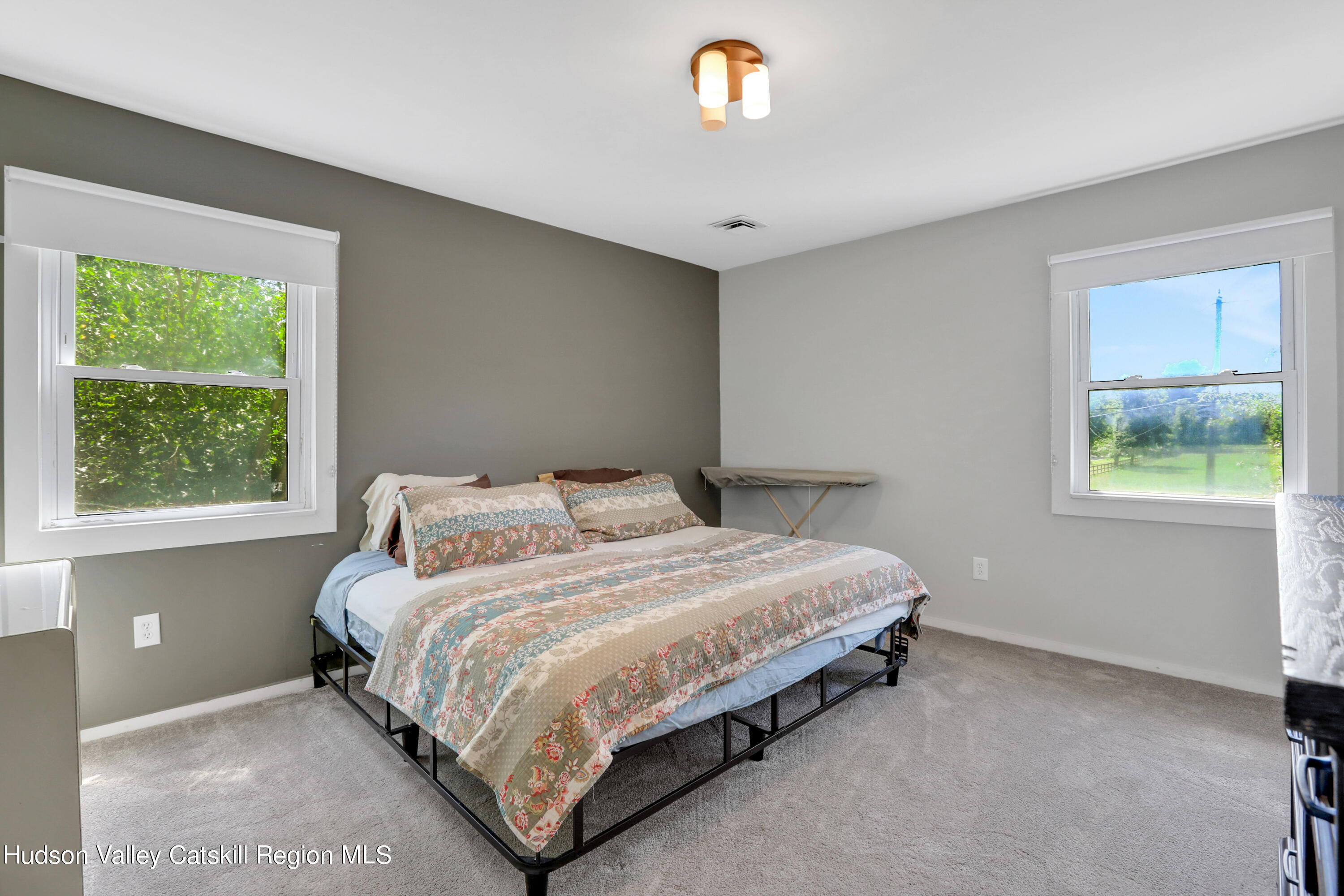 1 Dug Road New Paltz, NY 12561 - Photo 16 of 26 a bedroom with a bed and a window