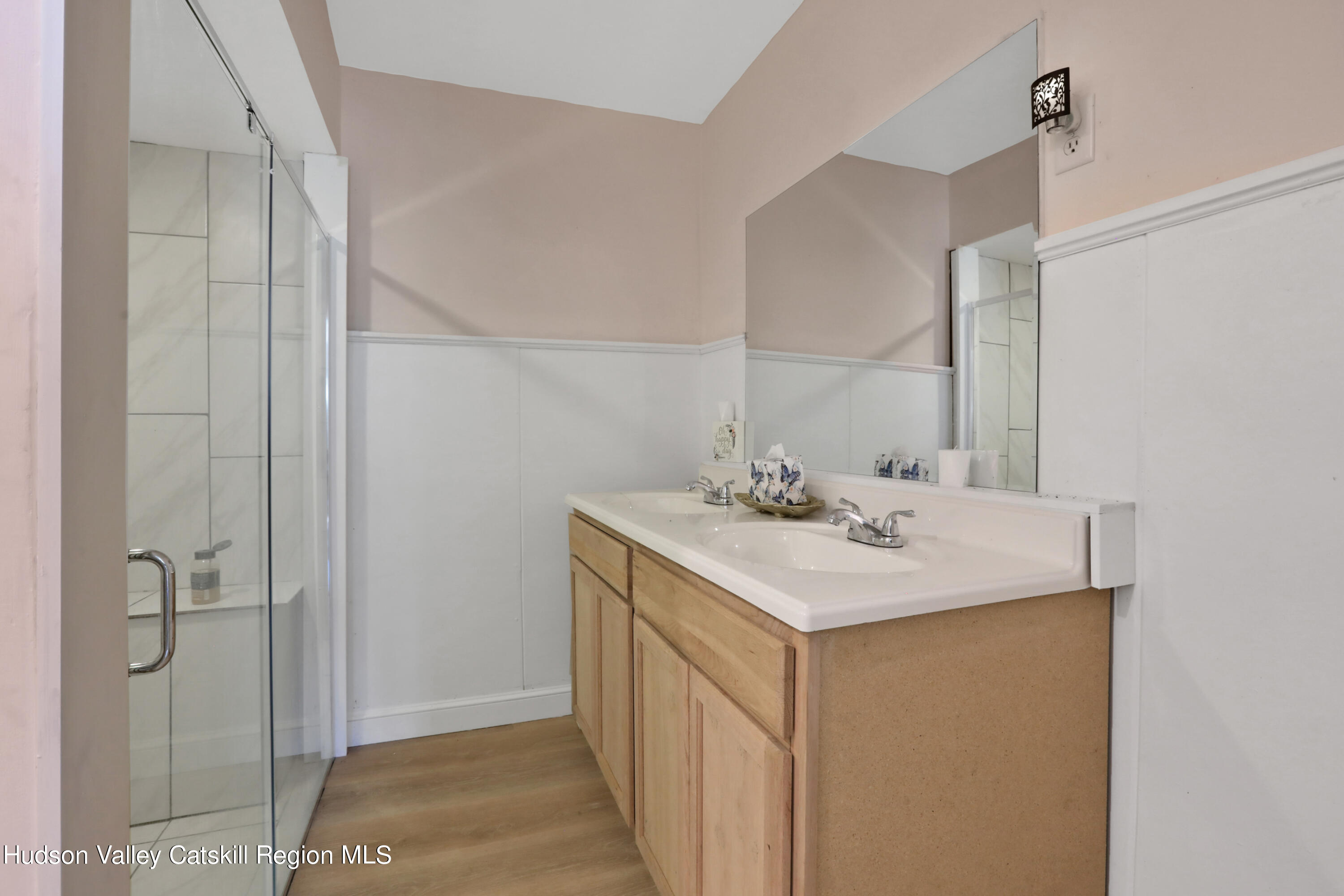 1 Dug Road New Paltz, NY 12561 - Photo 18 of 26 a bathroom with a sink and a mirror