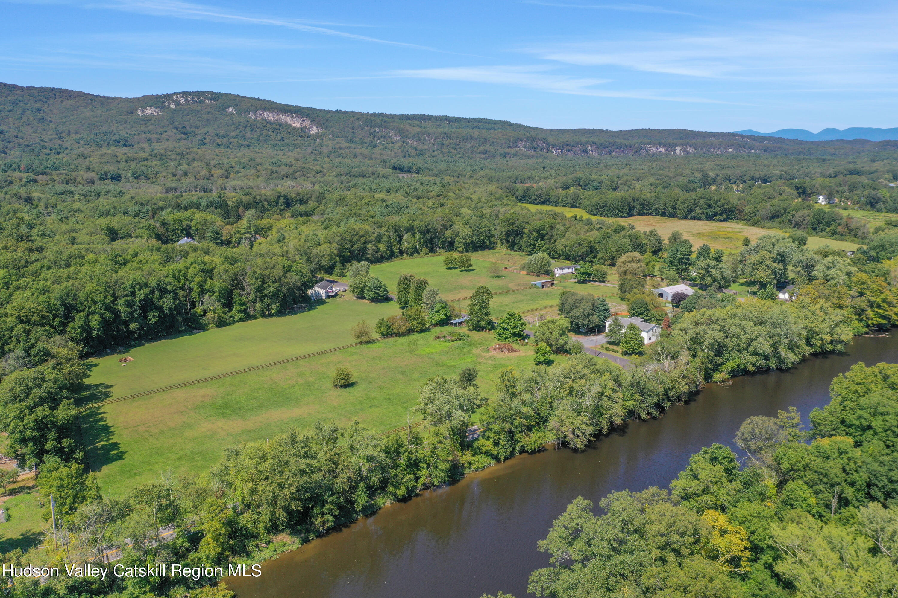 1 Dug Road New Paltz, NY 12561 - Photo 2 of 26 a view of a lush green forest with trees and houses