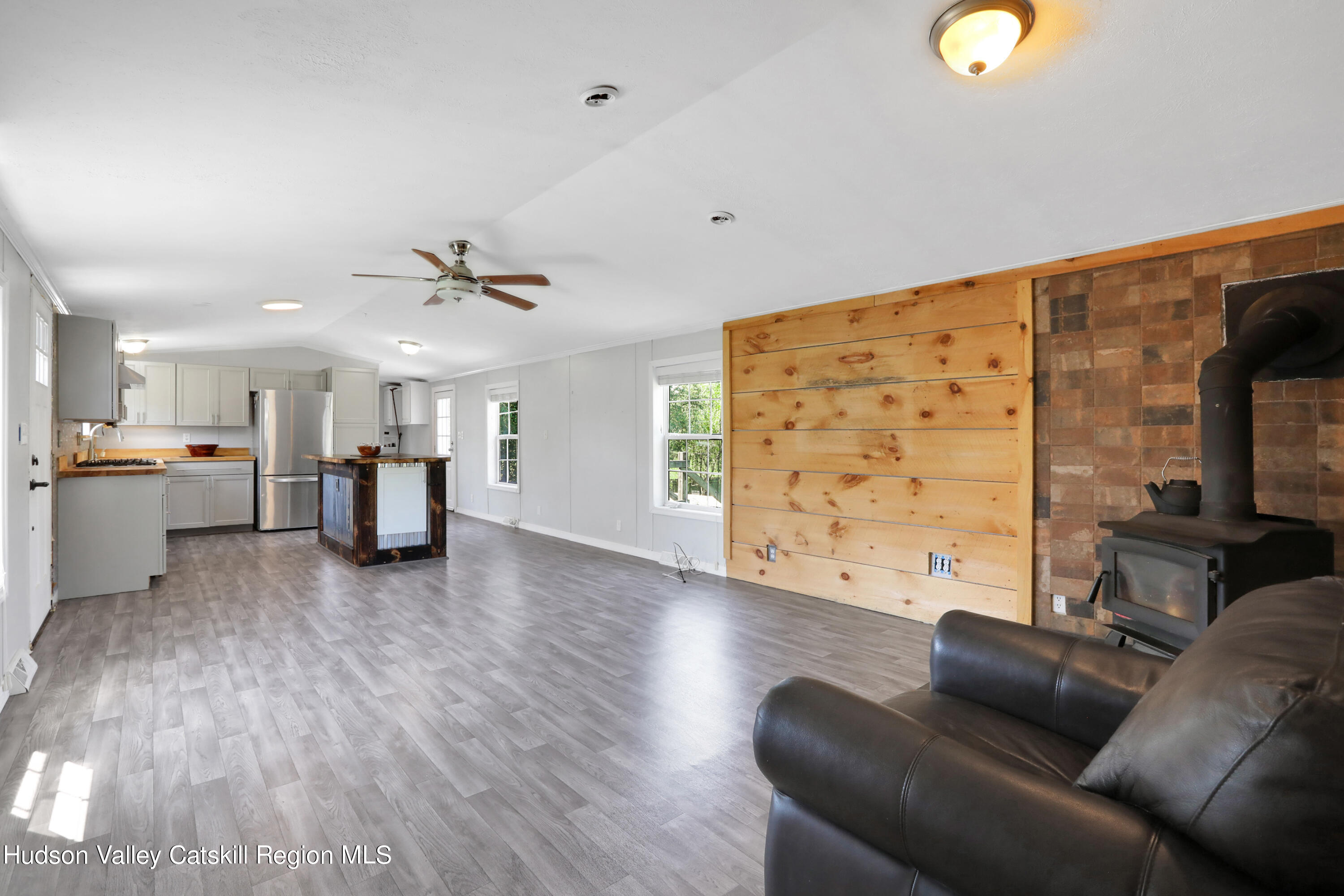 1 Dug Road New Paltz, NY 12561 - Photo 23 of 26 a living room with furniture and a flat screen tv