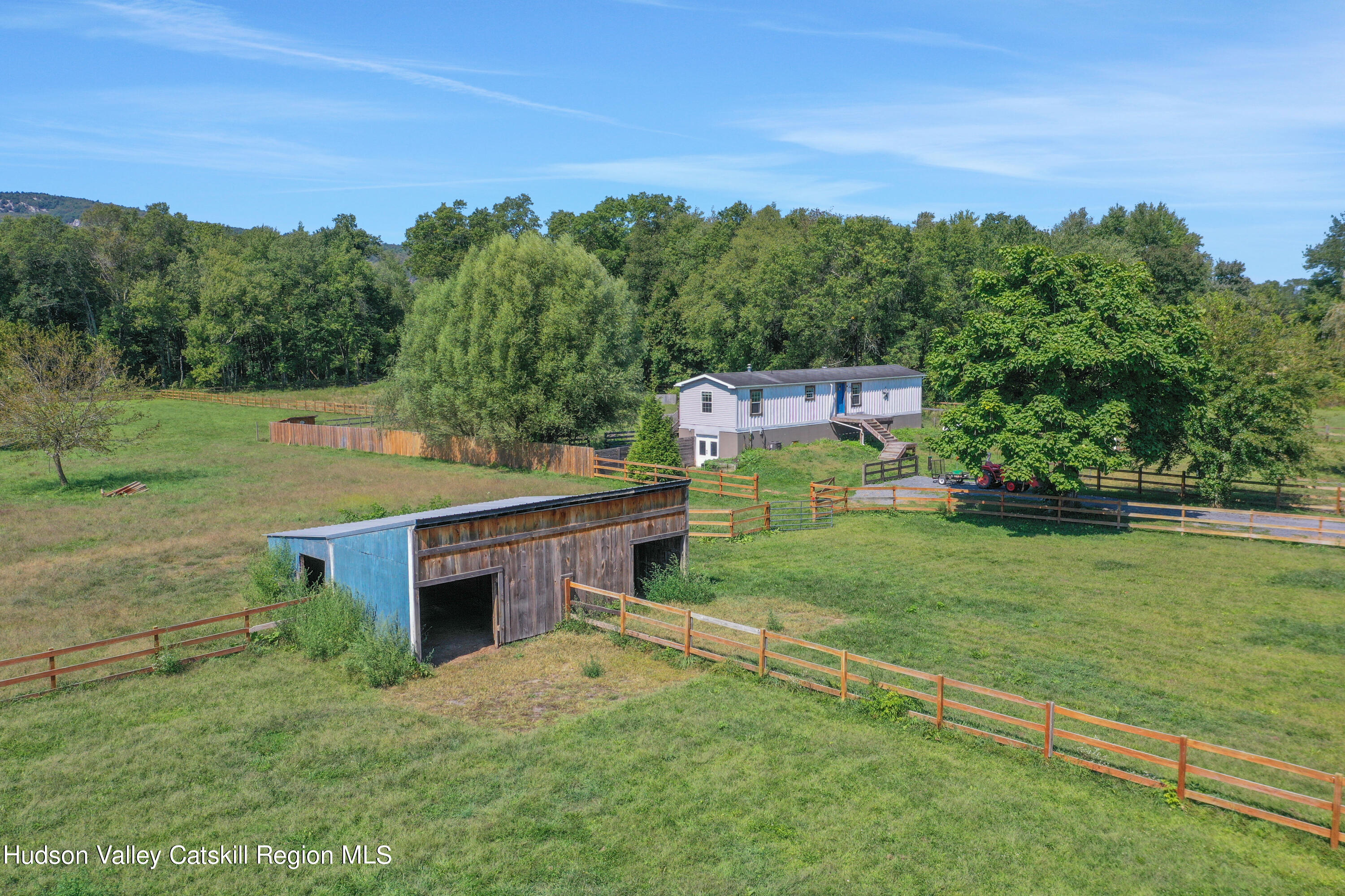 1 Dug Road New Paltz, NY 12561 - Photo 24 of 26 an aerial view of a house with garden space and outdoor seating