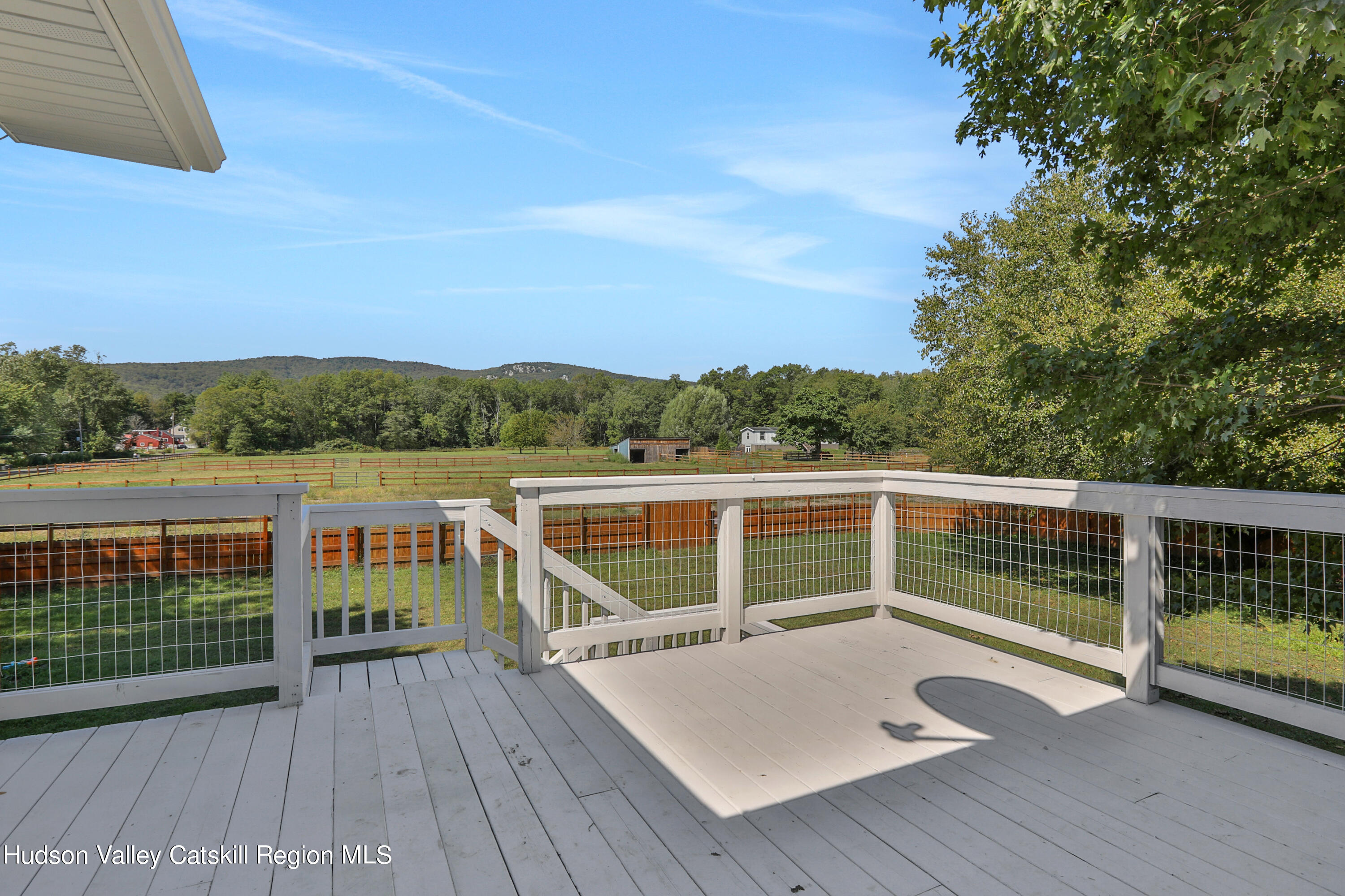 1 Dug Road New Paltz, NY 12561 - Photo 8 of 26 a view of balcony with deck and wooden floor