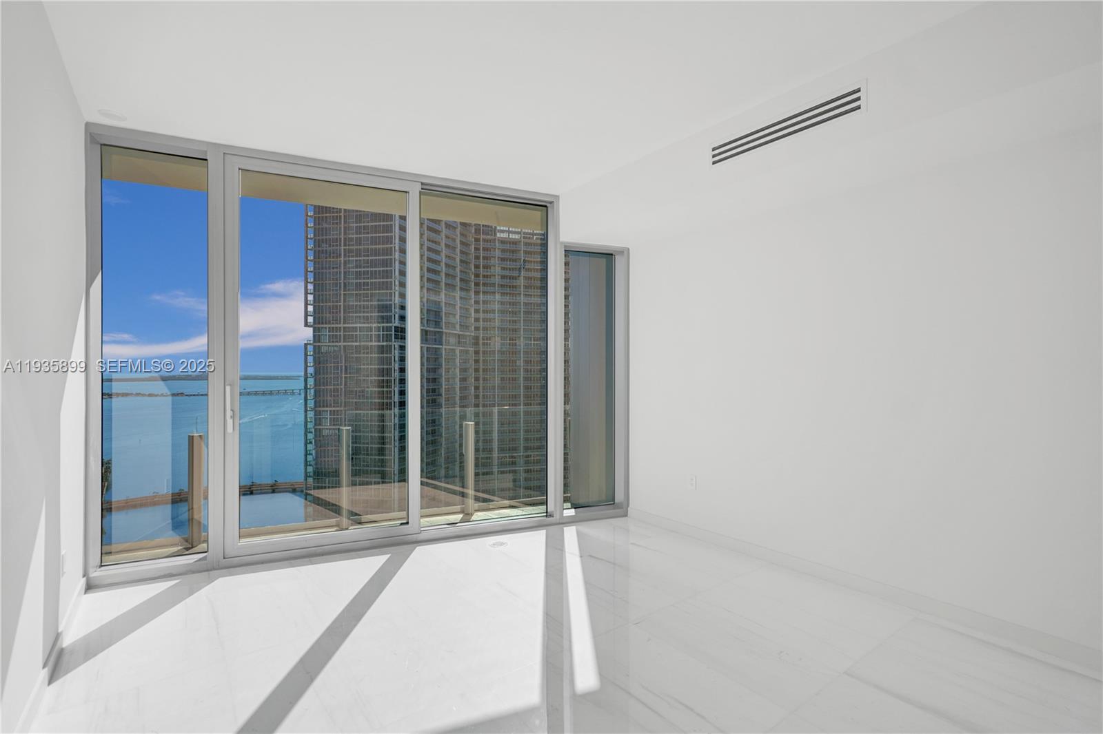 300 Biscayne Blvd Way, Unit 3605W Miami, FL 33131 - Photo 34 of 65 a view of an empty room with a balcony