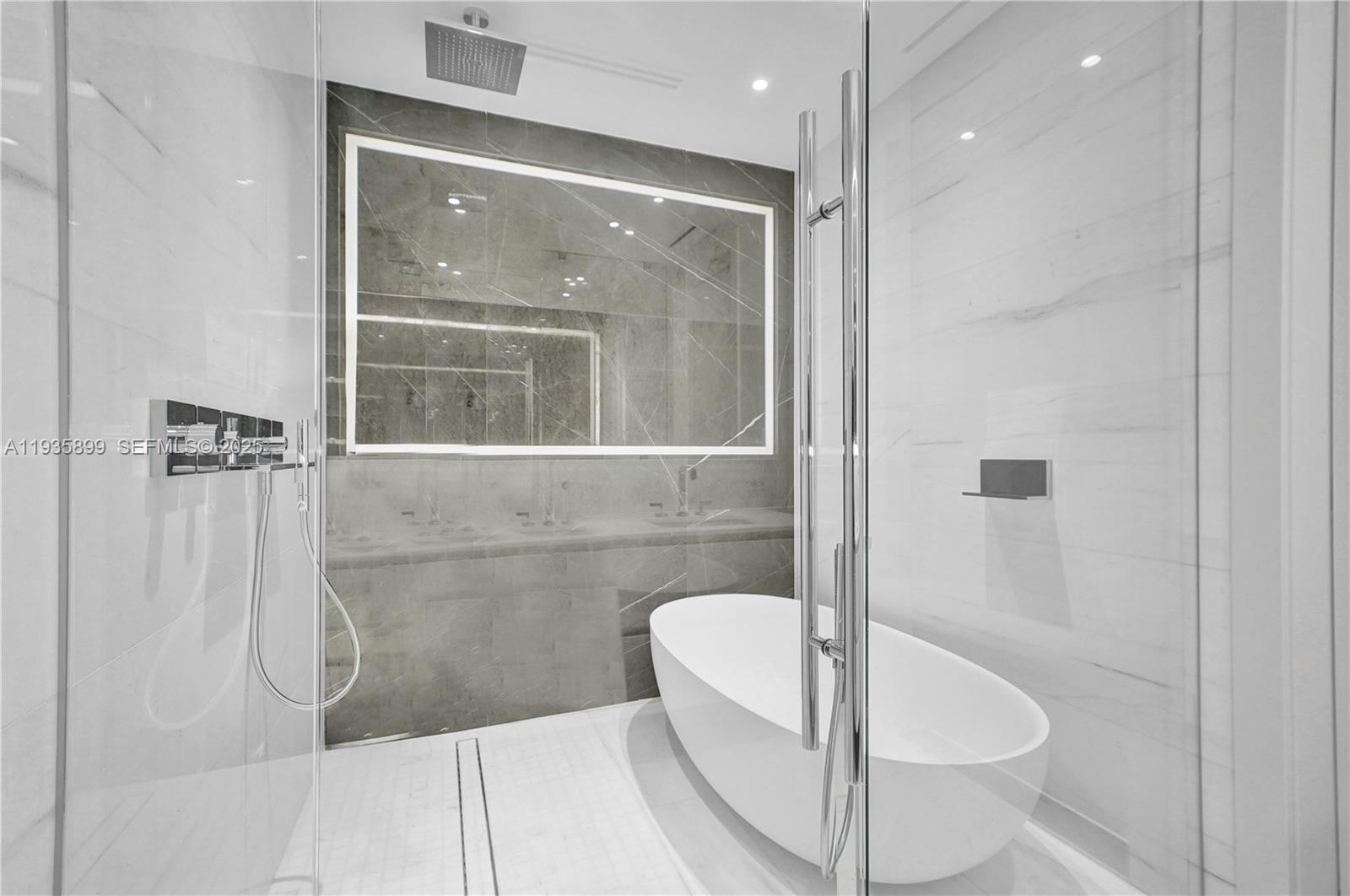 300 Biscayne Blvd Way, Unit 3605W Miami, FL 33131 - Photo 39 of 65 a bathroom with a shower