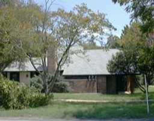 2601 Del Curto Road, Unit A102 Austin, TX 78704 - Photo 1 of 1 a backyard of a house with lots of green space