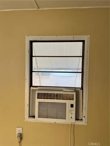 a stove top oven sitting inside of a kitchen
