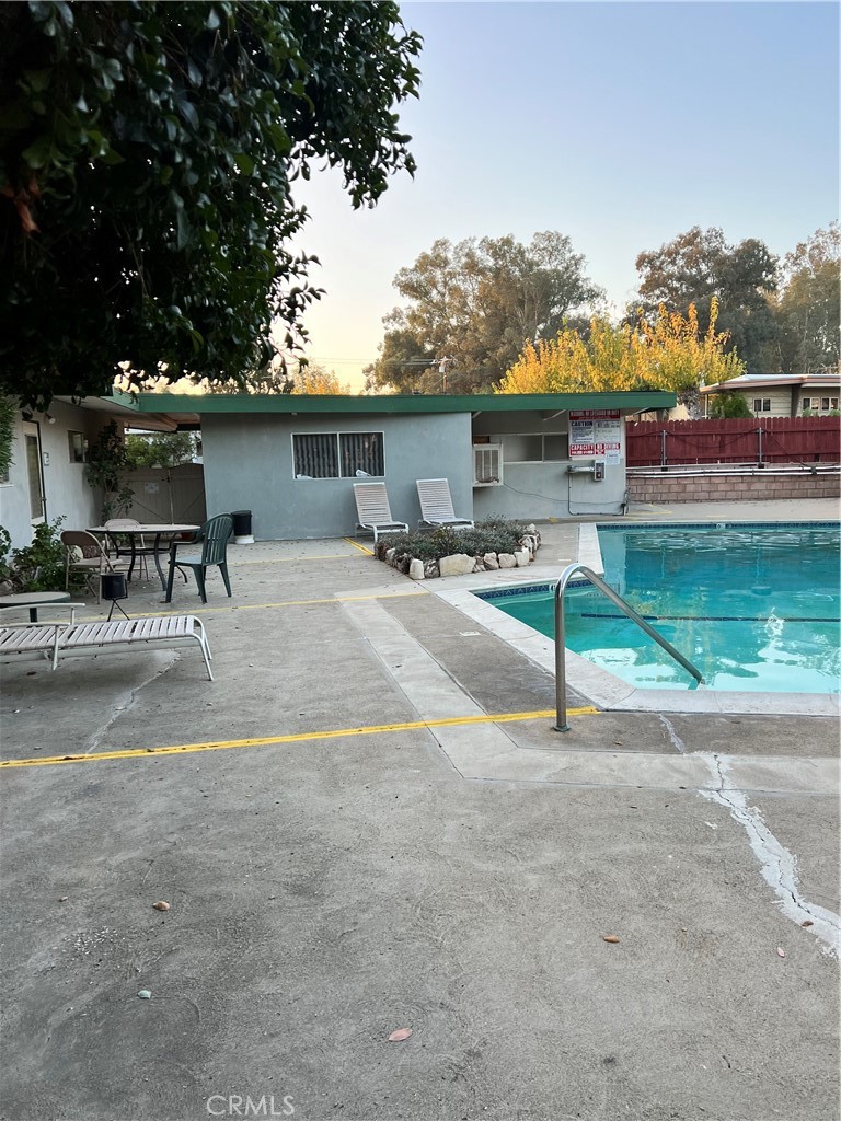 35080 Chandler Avenue, Unit 11 Calimesa, CA 92320 - Photo 19 of 20 a view of a backyard with a patio