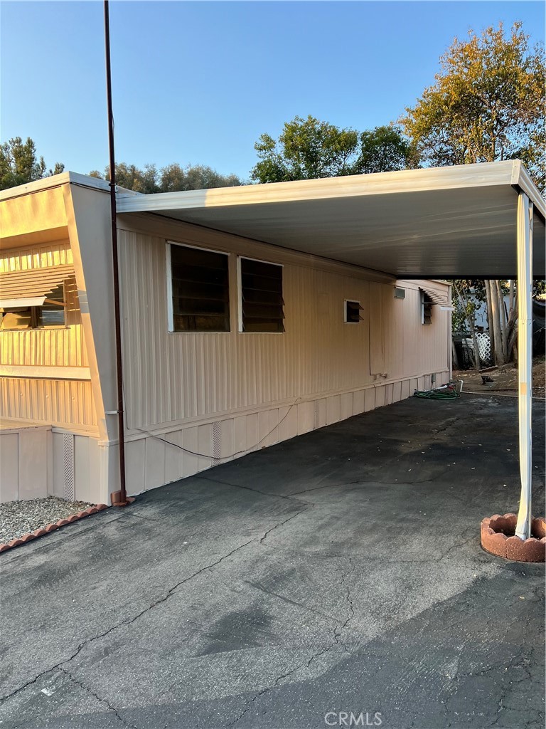 35080 Chandler Avenue, Unit 11 Calimesa, CA 92320 - Photo 4 of 20 a view of a house with a garage