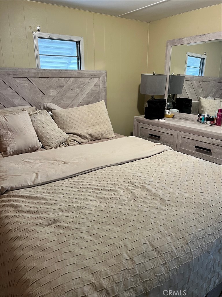 35080 Chandler Avenue, Unit 11 Calimesa, CA 92320 - Photo 10 of 20 a bedroom with a bed and a view of bedroom