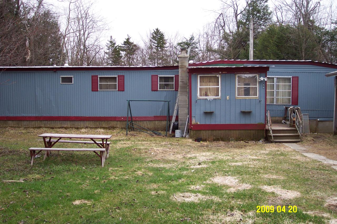 48 East Windsor Road Peru, MA 01235 - Photo 2 of 4 a view of a house with backyard