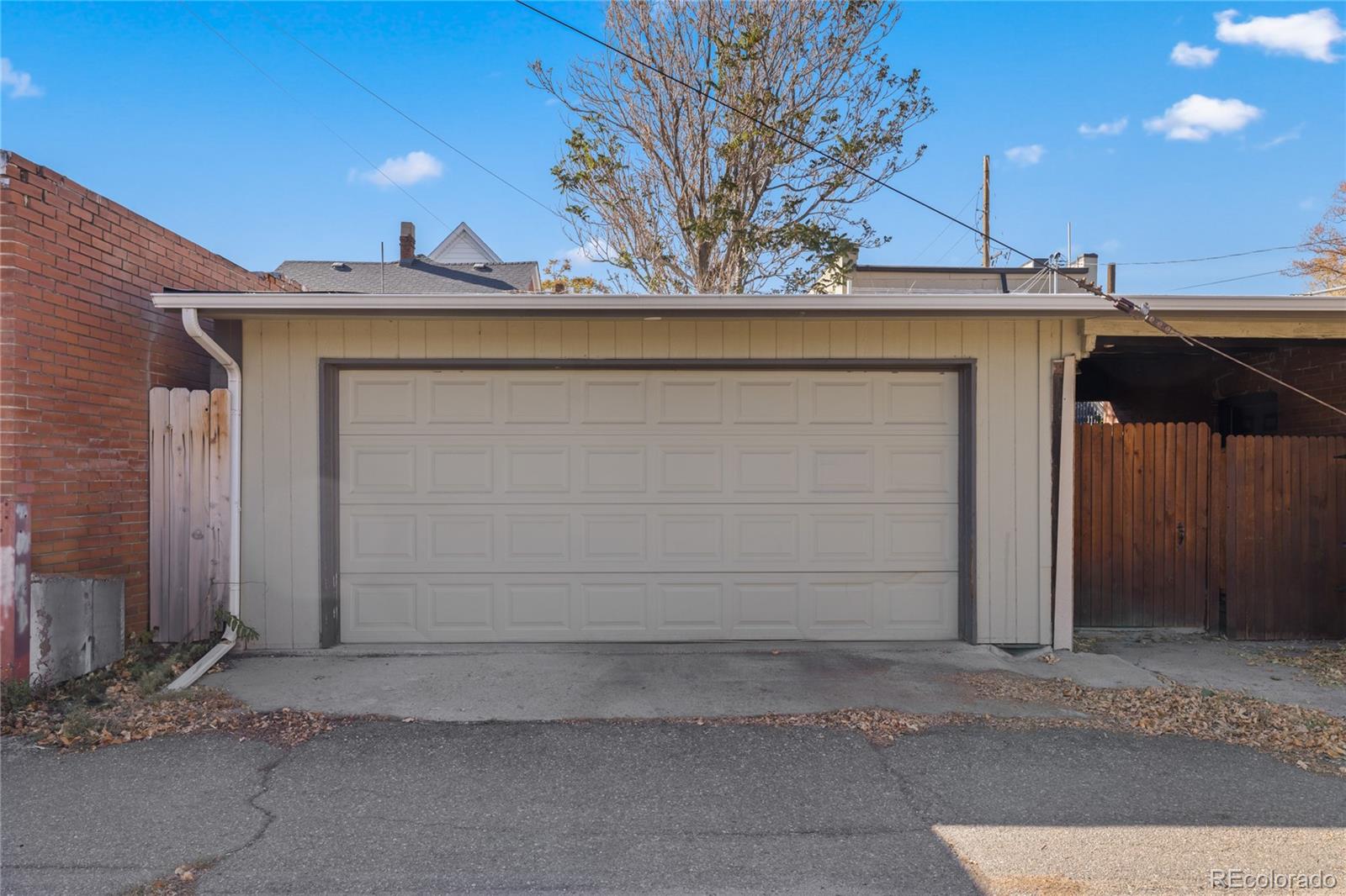 3460 North Pecos Street, Unit 1 Denver, CO 80211 - Photo 37 of 45 a view of a house with a garage
