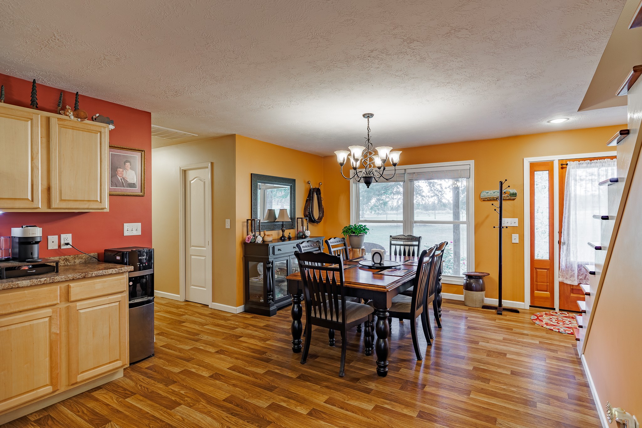625 Happy Hollow Road Washington, GA 30673 - Photo 14 of 50 a view of a dining room with furniture window and wooden floor