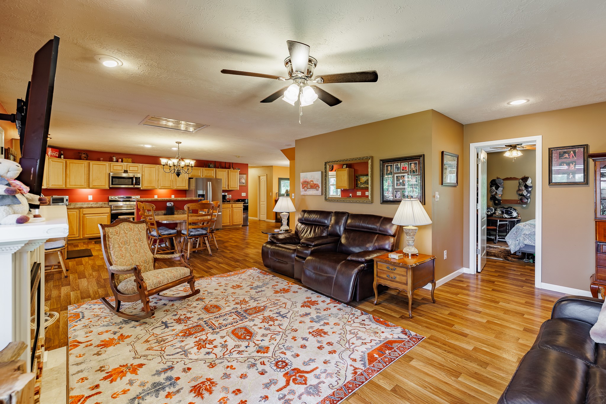 625 Happy Hollow Road Washington, GA 30673 - Photo 21 of 50 a living room with furniture and a flat screen tv