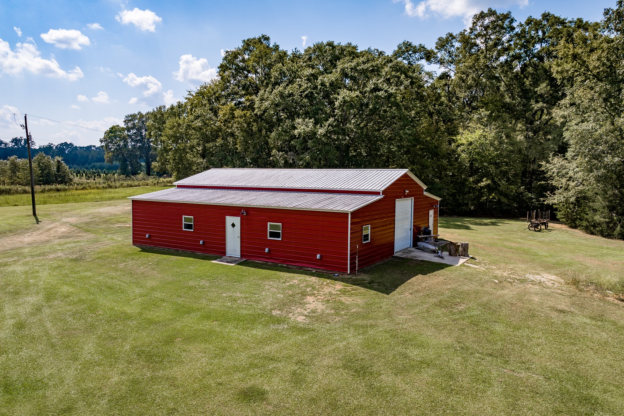625 Happy Hollow Road Washington, GA 30673 - Photo 8 of 50 a view of backyard with swimming pool and trees