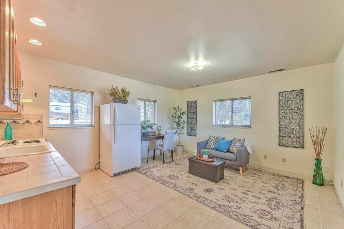 394 Mesa Road Salinas, CA 93908 - Photo 40 of 53 a living room with furniture and a table